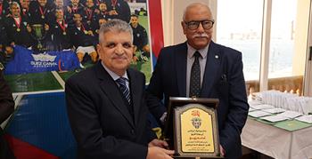 الفريق أسامة ربيع يكرم فريق الهوكي بنادي بورفؤاد الرياضي بعد تتويجه بطل إفريقيا للأندية في احتفالية رياضية