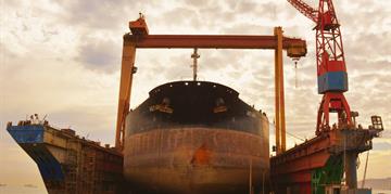 the floating dock at the Suez Shipyard Company receives a fuel tanker at the Suez Max